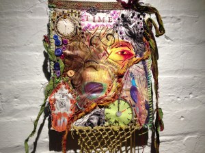 "Eye of Time (Peacock God Feather)" - fiber art / mixed media by Michael Sylvan Robinson (2010)